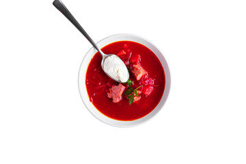 Borsch with meat, sour cream, parsley, beets and potatoes