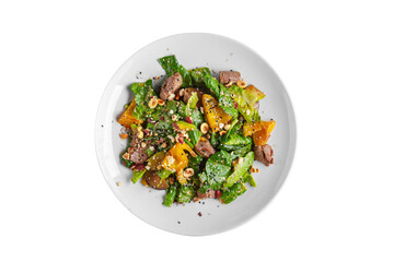 Salad with meat, pepper, arugula, sauce, hazelnuts, sesame seeds and spinach and zucchini