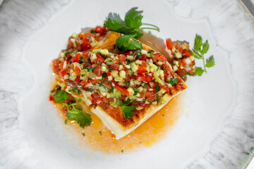 Sea bass fillet with tabouleh. - obrazy, fototapety, plakaty