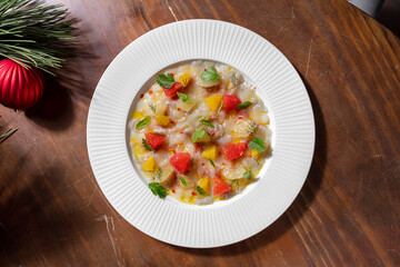 Raw squid meat with grapefruit, orange lemon, parsley