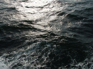 Dark ocean surface and rough wave image processed photograph.