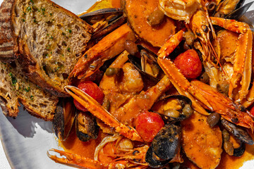 Sauteed seafood and rose wine