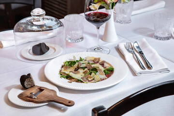 Cheese with truffle and arugula