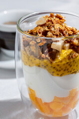 Ice cream with pineapple, pistachios, muesli, passionfruit, seeds and cheese