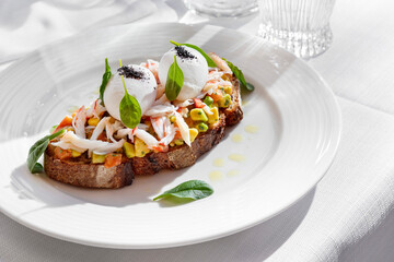 Sandwich with salmon, crab meat, boiled egg, avocado