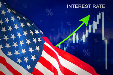 Obraz na płótnie Canvas America flag with increasing interest rate chart