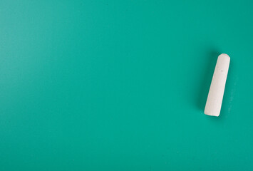 Color pencils on pink background, copy space .