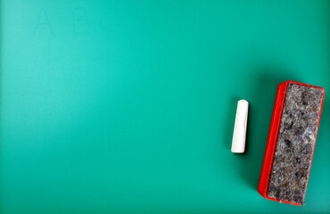 Color pencils on pink background, copy space .