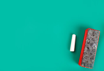 Color pencils on pink background, copy space .