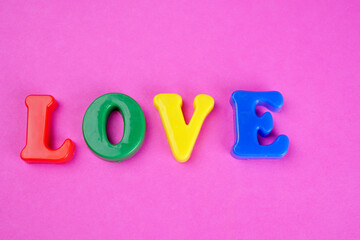 Colorful plastic alphabet letters isolated.