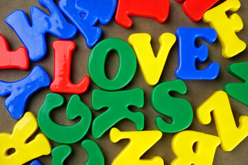 Fototapeta premium Alphabet on color background. School and education concept. Empty space for text and design