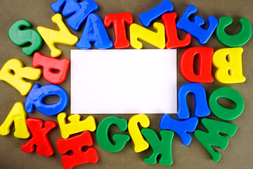 Fototapeta premium Alphabet on color background. School and education concept. Empty space for text and design