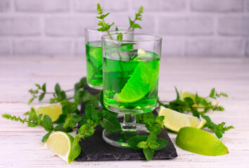 Mint liqueur with lime and mint leaves.

