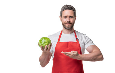 man in apron presenting cabbage vegetable isolated on white