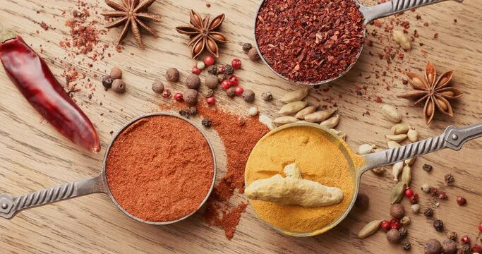 Wooden table of colorful spices.
