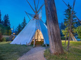 Story telling teepee in early morning in a public park in Canmore, Alberta - obrazy, fototapety, plakaty