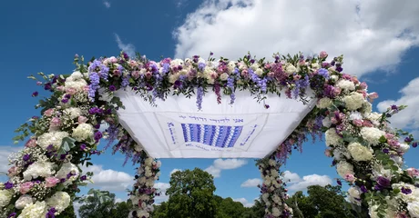 Foto op Plexiglas Chuppa wedding canopy under which Jewish couple get married. Canopy is inscribed with words from biblical book Song of Songs and reads: I am to my beloved and my beloved is to me. © Lois GoBe
