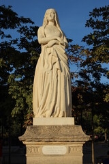 Sainte Genevieve, Patron Saint of Paris - statue sculpted by Michel Mercier. Part of the series 'Queens of France and Famous Women' seen inside the Luxembourg Gardens, Paris, France. 