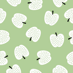 Seamless pattern with white apples and green background
