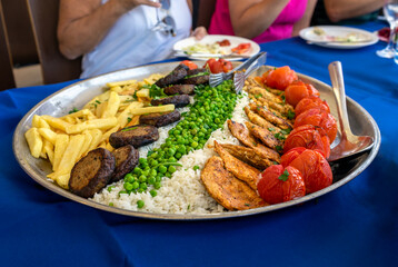Eating a Mediterranean Lunch Full of delicious foods and flavors. Israel