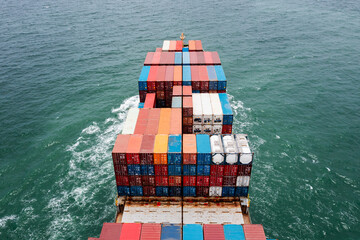 rear view of container ship logistics goods transportation import and export International by container cargo ship in the ocean, global business and industry service transportation of good by sea