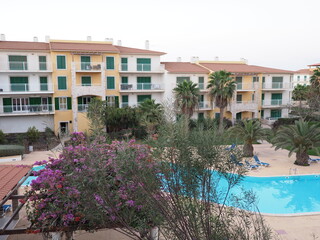 Fototapeta premium Mansion buildings and exotic trees on Sal island in Cape Verde