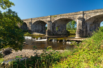 Fototapeta na wymiar The river South Tyne at Alston Arches, Haltwhistle after a period of dry weather in August 2022
