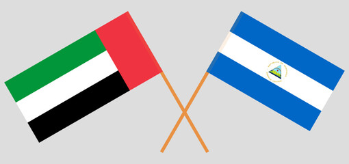 Crossed flags of the United Arab Emirates and Nicaragua. Official colors. Correct proportion