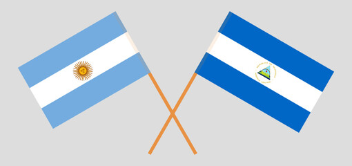 Crossed flags of Argentina and Nicaragua. Official colors. Correct proportion