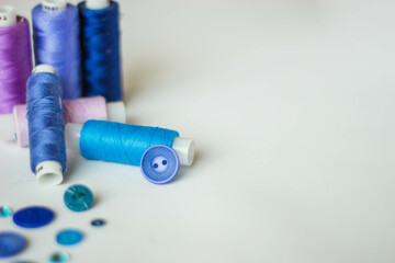 spools of thread and needle