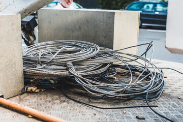 Steel cable rolls loaded in the back of a utility vehicle to be transported on a construction site