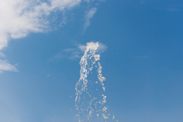 Scaffolding next to a new apartment building under construction. Metallic structure on a construction site