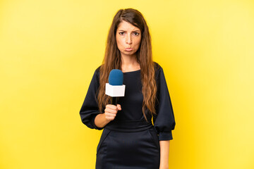 pretty caucasian woman feeling sad and whiney with an unhappy look and crying. tv presenter concept