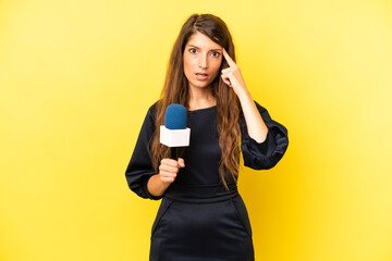 pretty caucasian woman looking surprised, realizing a new thought, idea or concept. tv presenter...