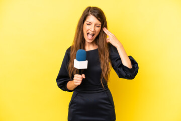 pretty caucasian woman looking unhappy and stressed, suicide gesture making gun sign. tv presenter...