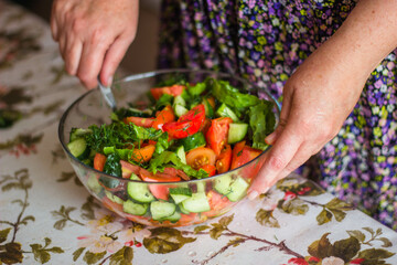 person cutting vegetables