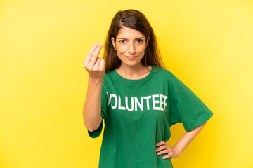 pretty caucasian woman making capice or money gesture, telling you to pay. enviromental volunteer concept