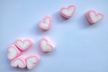 Rows of pink and white heart shaped marshmallow candies. Marshmallows in the shape of a heart on background. Valentine's day concept fill heart for full of love.