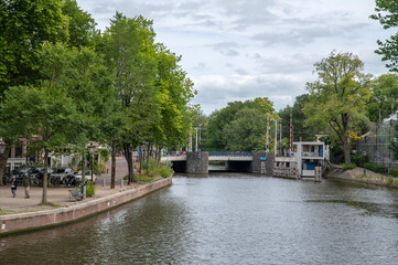 Fototapeta na wymiar View From The MS Vaz Diasbrug Bridge At Amsterdam The Netherlands 28-7-2022