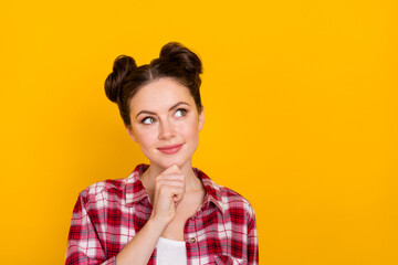Photo of cute minded person arm chin look interested empty space isolated on yellow color background