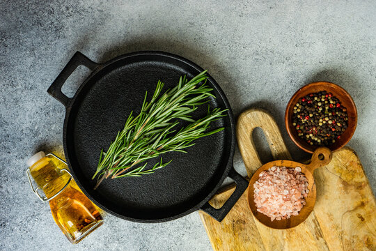Cooking concept with spices on concrete background