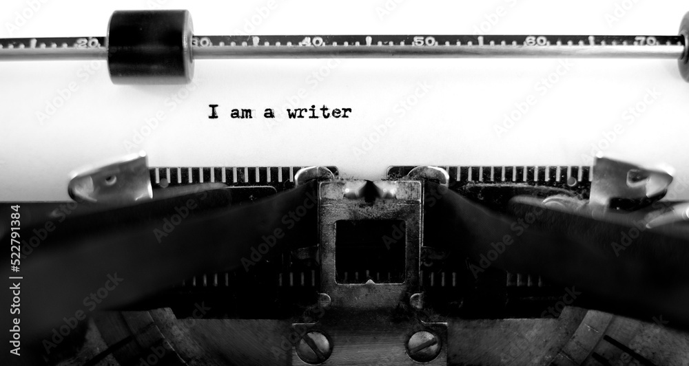 Fototapete old typewriter with paper i am a writer typed onto page