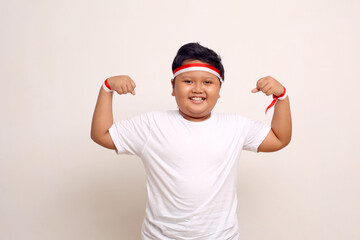 Naklejka premium Indonesian kids celebrate independence day. Isolated on white background