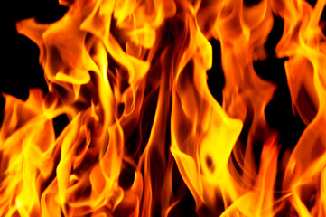 Fototapeta premium Heat energy heap closely, red and yellow, thermal energy at the fuel point during the night / lights on a black background