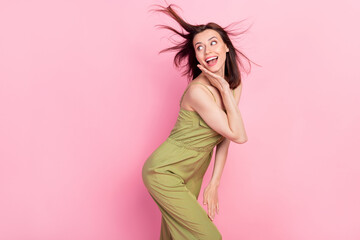 Profile photo of impressed brunette lady look promo wear khaki overall isolated on pink color background