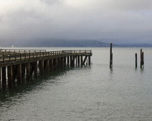 Obraz premium pier with fog and landscape