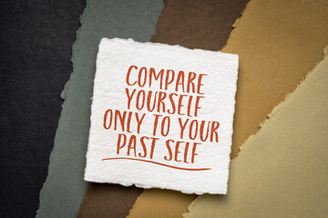 compare yourself only to your past self - inspirational note on white handmade paper against paper abstract in earth tones, personal development and growth concept