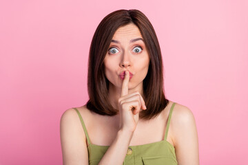 Photo of quiet brunette lady finger mouth wear khaki top isolated on pink color background