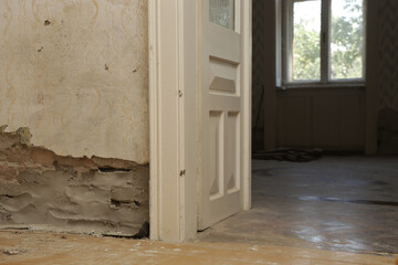 Moisture damage on the wall in the old house and the newly installed insulation of polyethylene barriers against moisture and rising damp
Renovation and home improvement.