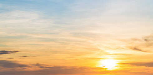 Naklejka na ściany i meble sunset sky clouds background with orange, golden hour background 